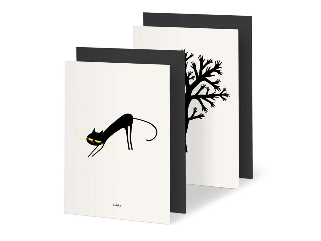 deux illustrations du répertoire d'Ich&Kar, accompagnées de leurs enveloppes noires assorties